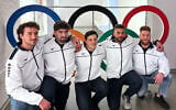 Members of Israel's bobsleigh team, from left, Uri Zisman, Omer Katz, AJ Edelman, Ward Farwaseh and Itamar Shprinz, pose at the Olympic Committee of Israel headquarters, January 28, 2026, in Tel Aviv, before their departure for the 2026 Winter Olympics. (AP/Julia Frankel)