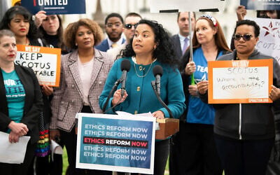 Analilia Mejia, center, speaks during a rally calling for US Supreme Court ethics reform, May 2, 2023, in Washington. (Joy Asico/AP Images for Center for Popular Democracy Action)