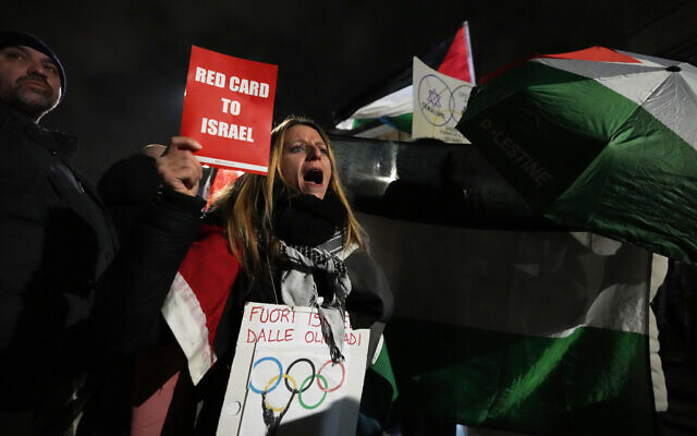Protesters demonstrate against Israel's participation in the Olympic Games in Milan, Italy, February 5, 2026. (AP Photo/Antonio Calanni)