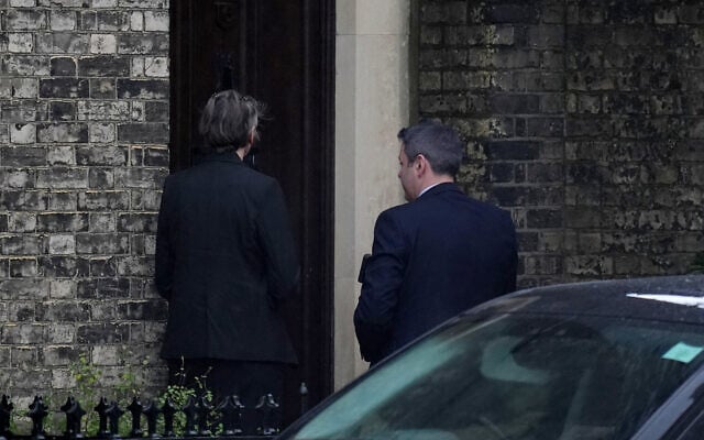 Two people wait to enter the home of Lord Peter Mandelson in north west London, Friday, Feb. 6, 2026. (Maja Smiejkowska/PA via AP) Two people wait to enter the home of Lord Peter Mandelson in north west London, Friday, Feb. 6, 2026. (Maja Smiejkowska/PA via AP)