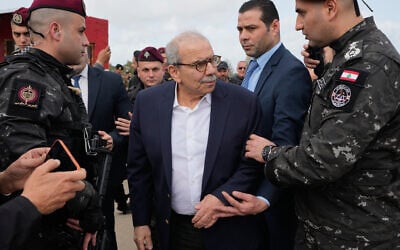 Lebanese Prime Minister Nawaf Salam, center, tours areas in southern Lebanon along the border with Israel in the village of Tayr Harfa, February 7, 2026. (AP Photo/Mohammed Zaatari) Lebanese Prime Minister Nawaf Salam, center, tours areas in southern Lebanon along the border with Israel in the village of Tayr Harfa, February 7, 2026. (AP Photo/Mohammed Zaatari)