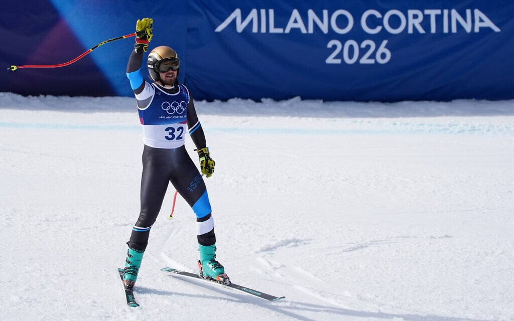 Israel's Barnabas Szollos celebrates at the finish area of an alpine ski men's downhill race, at the 2026 Winter Olympics, in Bormio, Italy, February 7, 2026. (AP Photo/Rebecca Blackwell) Israel's Barnabas Szollos celebrates at the finish area of an alpine ski men's downhill race, at the 2026 Winter Olympics, in Bormio, Italy, February 7, 2026. (AP Photo/Rebecca Blackwell)