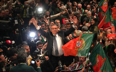 Center-left Socialist candidate António José Seguro celebrates after defeating far-right populist André Ventura in the second round of Portugal's presidential election in Lisbon, February 8, 2026. (AP/Ana Brigida)