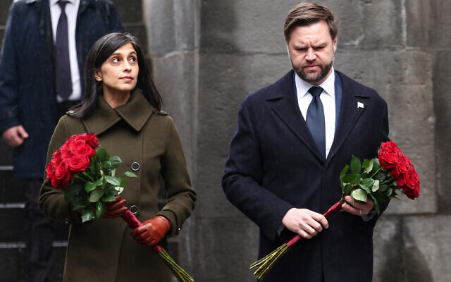 US Vice President JD Vance and second lady Usha Vance hold flowers as they walk towards the eternal flame at the Tsitsernakaberd Armenian Genocide Memorial in Yerevan, Armenia, February 10, 2026. (Kevin Lamarque/Pool Photo via AP) US Vice President JD Vance and second lady Usha Vance hold flowers as they walk towards the eternal flame at the Tsitsernakaberd Armenian Genocide Memorial in Yerevan, Armenia, February 10, 2026. (Kevin Lamarque/Pool Photo via AP)