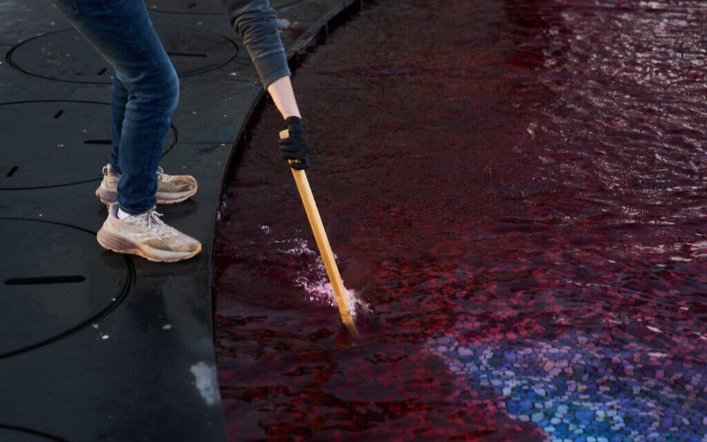 An activist pours red dye symbolizing blood into an ornamental pool during a protest calling for action on deadly violence in Arab communities in Tel Aviv, Feb. 10, 2026. (AP Photo/Ariel Schalit) An activist pours red dye symbolizing blood into an ornamental pool during a protest calling for action on deadly violence in Arab communities in Tel Aviv, Feb. 10, 2026. (AP Photo/Ariel Schalit)