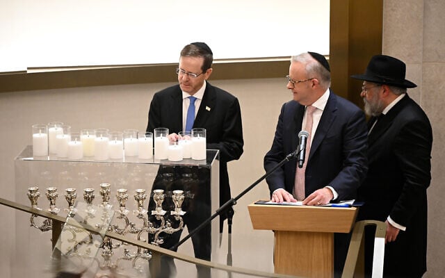 President Isaac Herzog, left, and Australian Prime Minister Anthony Albanese, center, attend a ceremony at the Chabad of Bondi in Sydney, Australia, February 10, 2026. (Bianca De Marchi/Pool via AP) President Isaac Herzog, left, and Australian Prime Minister Anthony Albanese, center, attend a ceremony at the Chabad of Bondi in Sydney, Australia, February 10, 2026. (Bianca De Marchi/Pool via AP)