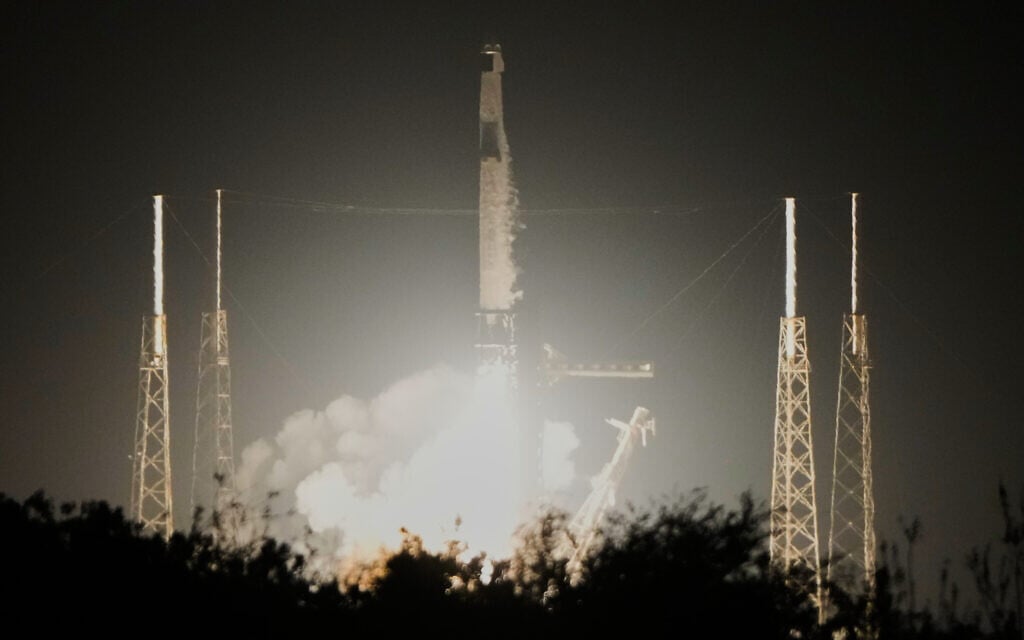 A SpaceX Falcon 9 rocket with a crew of four aboard the Dragon space craft lifts off from pad 40 at the Cape Canaveral Space Force Station in Florida, February 13, 2026. (AP Photo/John Raoux) A SpaceX Falcon 9 rocket with a crew of four aboard the Dragon space craft lifts off from pad 40 at the Cape Canaveral Space Force Station in Florida, February 13, 2026. (AP Photo/John Raoux)