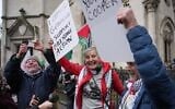 Supporters of Palestine Action stage a protest outside the Royal Court of Justice in London, February 13, 2026. (AP Photo/Kin Cheung)