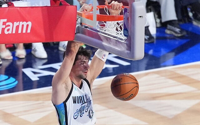 World forward Devin Avdija, of Israel, dunks during the NBA All-Star basketball game Sunday, Feb. 15, 2026, in Inglewood, Calif. (AP Photo/Jae C. Hong) World forward Devin Avdija, of Israel, dunks during the NBA All-Star basketball game Sunday, Feb. 15, 2026, in Inglewood, Calif. (AP Photo/Jae C. Hong)