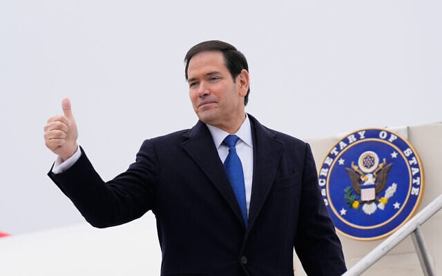 US Secretary of State Marco Rubio gives a thumbs up as he departs at the Liszt Ferenc International Airport in Budapest, Hungary, February 16, 2026. (AP/Alex Brandon, Pool)
