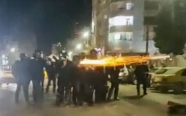 This image from a video verified by AP shows Iranian security forces shooting into the courtyard outside the Imam Khomeini Hospital, in Ilam, Iran, January 4, 2026. (UGC via AP, File) This image from a video verified by AP shows Iranian security forces shooting into the courtyard outside the Imam Khomeini Hospital, in Ilam, Iran, January 4, 2026. (UGC via AP, File)