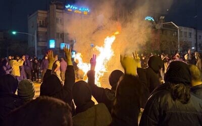 In this photo obtained by The Associated Press, Iranians attend an anti-government protest in Tehran, Iran, January 9, 2026. (UGC via AP)