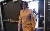 Chicago Treasurer Melissa Conyears-Ervin smiles as she walks into Marshall Metro high school to vote in Chicago, March 19, 2024. (AP Photo/Nam Y. Huh, File)
