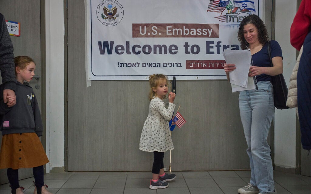 Kayla Friedson, center, and her mother wait for their turn to receive consular services from US embassy officials in the Efrat settlement in the West Bank, Feb.27, 2026. (AP/Ohad Zwigenberg)