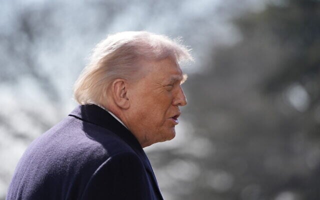 US President Donald Trump talks to the media as he walks to depart on Marine One from the South Lawn of the White House, February 27, 2026, in Washington. (AP Photo/Alex Brandon)