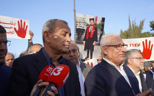 High Follow-Up Committee chairman Jamal Zahalka and Sakhnin Mayor Mazen Ghanaim deliver a statement to Prime Minister Benjamin Netanyahu outside his office in Jerusalem on February 8, 2026. (Charlie Summers/Times of Israel)