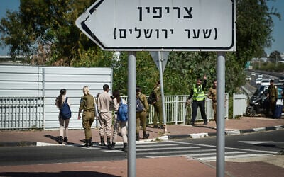 Soldiers are seen at the entrance to Tzrifin military base in central Israel, April 4, 2023. (Avshalom Sassoni/Flash90)