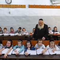Ultra-Orthodox children in their classroom at a Heder in Jerusalem, August 25, 2025. (Chaim Goldberg/Flash90)