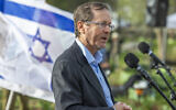 President Isaac Herzog attends a ceremony marking the Jewish holiday of Tu Bishvat in the Ben Shemen Forest on February 2, 2026. (Yossi Aloni/Flash90)