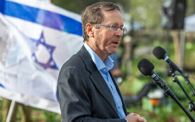 President Isaac Herzog attends a ceremony marking the Jewish holiday of Tu Bishvat in the Ben Shemen Forest on February 2, 2026. (Yossi Aloni/Flash90) President Isaac Herzog attends a ceremony marking the Jewish holiday of Tu Bishvat in the Ben Shemen Forest on February 2, 2026. (Yossi Aloni/Flash90)