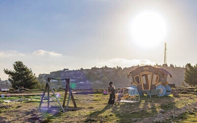 An Israeli family is seen at the outpost of Yahish Zion, near the settlement of Psagot, in the West Bank, on February 4, 2026. (Dor Pazuelo/Flash90) An Israeli family is seen at the outpost of Yahish Zion, near the settlement of Psagot, in the West Bank, on February 4, 2026. (Dor Pazuelo/Flash90)