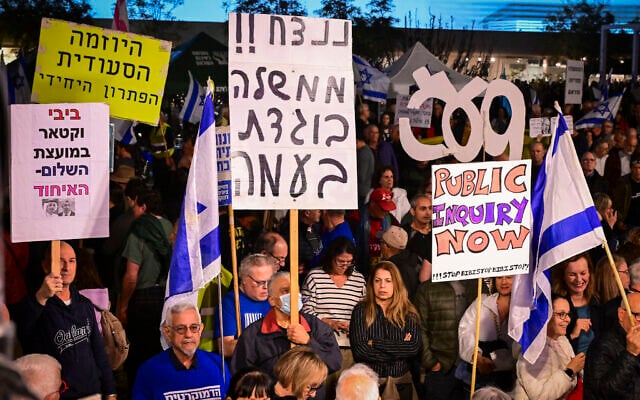 People attend a protest demanding the establishment of a state commission of inquiry into the October 7, 2023, attacks, at Habima Square in Tel Aviv, February 7, 2026. (Avshalom Sassoni/Flash90) People attend a protest demanding the establishment of a state commission of inquiry into the October 7, 2023, attacks, at Habima Square in Tel Aviv, February 7, 2026. (Avshalom Sassoni/Flash90)
