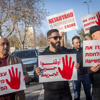 Leaders of the Arab community, including members of the Knesset, protest against violence in their community outside the Prime Minister’s Office in Jerusalem, on February 8, 2026. (Chaim Goldberg/Flash90)