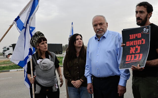 Yisrael Beytenu chair Avigdor Lieberman (Second right) stands with activists from the Tzav 9 organization protesting the transfer of humanitarian aid into the Gaza Strip, February 9, 2026. (Tsafrir Abayov/Flash90) Yisrael Beytenu chair Avigdor Lieberman (Second right) stands with activists from the Tzav 9 organization protesting the transfer of humanitarian aid into the Gaza Strip, February 9, 2026. (Tsafrir Abayov/Flash90)
