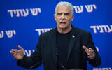 Yesh Atid chief Yair Lapid leads a faction meeting at the Knesset on February 9, 2026.(Yonatan Sindel/Flash90)