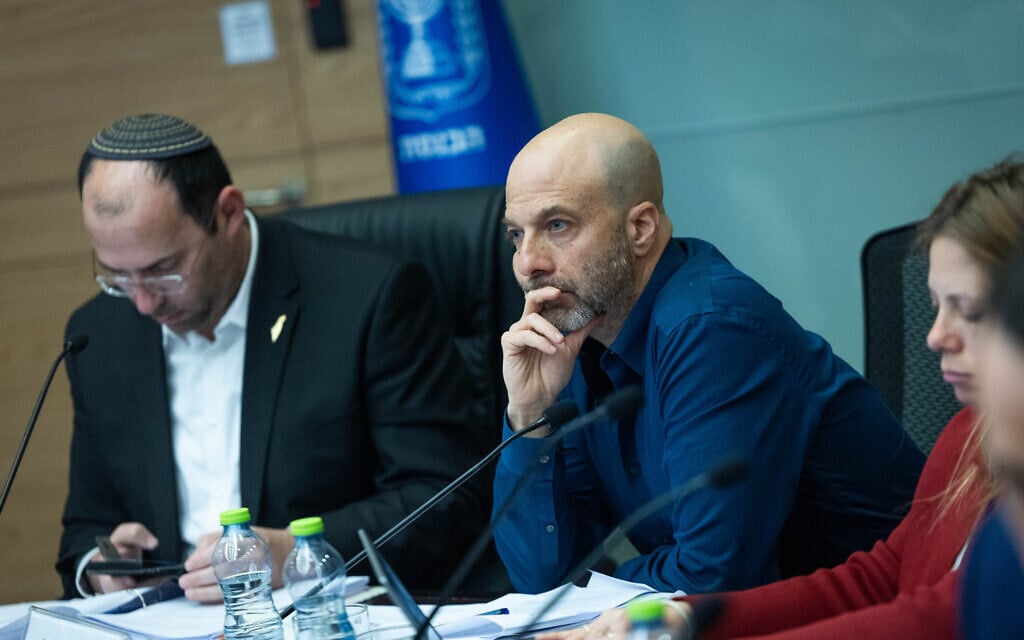 Knesset Constitution, Law and Justice Committee Legal Adviser Gur Bligh, center, and committee chairman MK Simcha Rothman attend a committee meeting in Jerusalem, February 11, 2026. (Yonatan Sindel/Flash90)