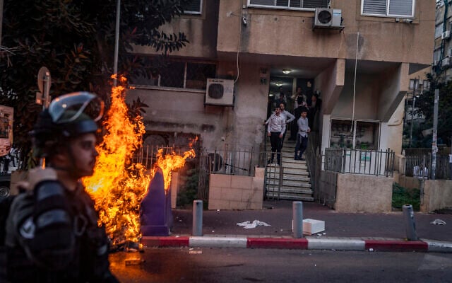 Ultra-Orthodox Jewish men clash with police following an assault on two female Israeli soldiers in Bnei Brak, central Israel, February 15, 2026. (Flash90) Ultra-Orthodox Jewish men clash with police following an assault on two female Israeli soldiers in Bnei Brak, central Israel, February 15, 2026. (Flash90)