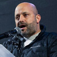 Former national security adviser Eyal Hulata speaks at an anti-government protest demanding the establishment of a state commission of inquiry into Hamas's onslaught of October 7, 2023, at Habima Square in Tel Aviv, February 21, 2026. (Avshalom Sassoni/Flash90)
