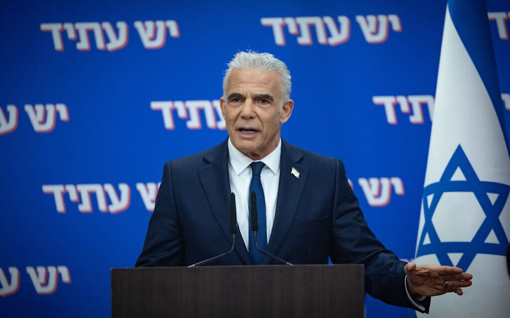 Opposition leader Yair Lapid leads a Yesh Atid party faction meeting at the Knesset in Jerusalem on February 23, 2026. (Yonatan Sindel/Flash90)