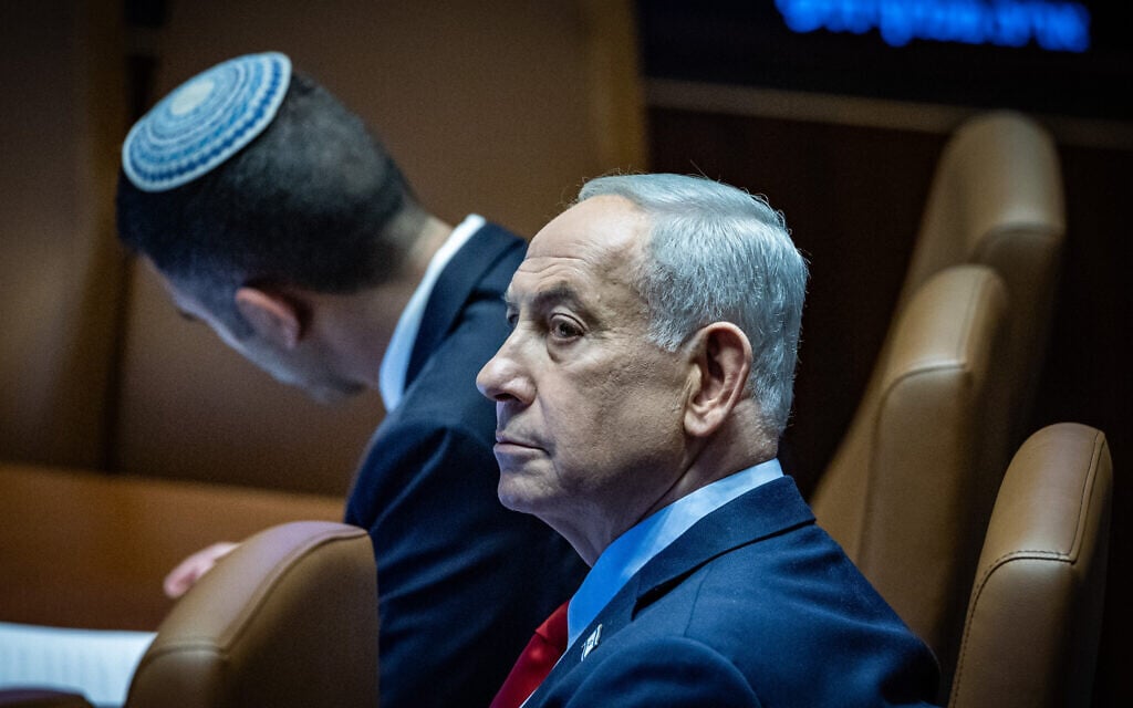 Prime Minister Benjamin Netanyahu seen in the Knesset plenum in Jerusalem on February 23, 2026. (Yonatan Sindel/Flash90)