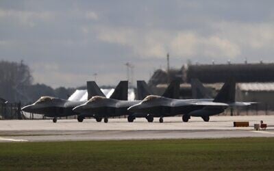 US F-22 stealth fighter jets are seen before taking off from Royal Air Force Lakenheath in England, en route to Israel, February 24, 2026. (@TallGlenn85 on X)