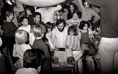 'New York Havurah Shabbat School, Jay Greenspan, Simchat Torah, 1976' dates to photographer Bill Aron's time as a member of the grassroots Jewish congregation on the Upper West Side of Manhattan. (Bill Aron, American Jewish Historical Society via JTA)