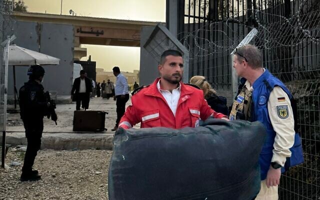 A Palestinian border agent carries luggage through Rafah Crossing, February 2026 (EUBAM) A Palestinian border agent carries luggage through Rafah Crossing, February 2026 (EUBAM)