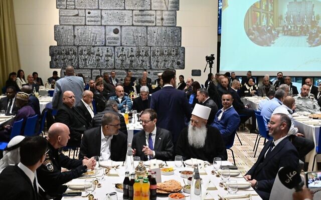 President Isaac Herzog (center) hosts an iftar dinner at his official residence in Jerusalem on February 23, 2026. (Kobi Gideon/GPO)
