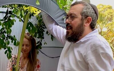 Nikki Goldstein and Rabbi Eli Schlanger celebrate Sukkot. (Courtesy via JTA) Nikki Goldstein and Rabbi Eli Schlanger celebrate Sukkot. (Courtesy via JTA)