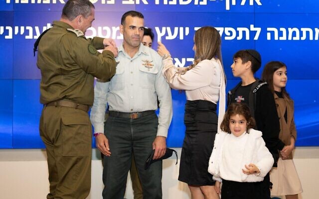 Brig. Gen. Avinoam Emunah, incoming adviser to the IDF chief of staff on ultra-Orthodox affairs, is awarded the rank of brigadier general by IDF Chief of Staff Lt. Gen. Eyal Zamir (left) and his family, February 24, 2026. (Israel Defense Forces) Brig. Gen. Avinoam Emunah, incoming adviser to the IDF chief of staff on ultra-Orthodox affairs, is awarded the rank of brigadier general by IDF Chief of Staff Lt. Gen. Eyal Zamir (left) and his family, February 24, 2026. (Israel Defense Forces)