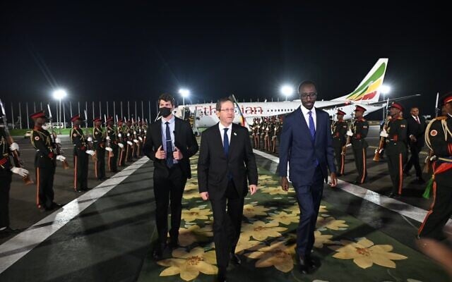 President Isaac Herzog (center) is greeted at the airport in Addis Ababa by Ethiopian Foreign Minister Gedion Timothewos (right) on February 25, 2026. (Haim Zach/GPO) President Isaac Herzog (center) is greeted at the airport in Addis Ababa by Ethiopian Foreign Minister Gedion Timothewos (right) on February 25, 2026. (Haim Zach/GPO)