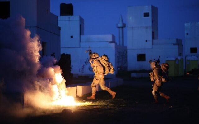 Troops of the Hasmonean Brigade's Yonatan Battalion conduct a drill in the Golan Heights, in a handout photo published by the military on February 11, 2026. (Israel Defense Forces) Troops of the Hasmonean Brigade's Yonatan Battalion conduct a drill in the Golan Heights, in a handout photo published by the military on February 11, 2026. (Israel Defense Forces)