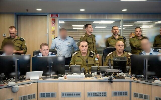 IDF Chief of Staff Lt. Gen. Eyal Zamir (center), is seen alongside IAF chief Maj. Gen. Tomer Bar (left) and Deputy Chief of Staff Maj. Gen. Tamir Yadai (right), at the IAF's underground command center at the IDF HQ in Tel Aviv, February 28, 2026. (Israel Defense Forces) IDF Chief of Staff Lt. Gen. Eyal Zamir (center), is seen alongside IAF chief Maj. Gen. Tomer Bar (left) and Deputy Chief of Staff Maj. Gen. Tamir Yadai (right), at the IAF's underground command center at the IDF HQ in Tel Aviv, February 28, 2026. (Israel Defense Forces)