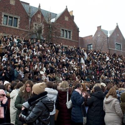 Female emissaries of the  Chabad-Lubavitch movement gather for a group photo in Crown Heights, Brooklyn, on February 6, 2026. (Jewish Telegraphic Agency)