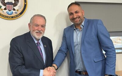 US Ambassador Mike Huckabee (left) meets with Israeli Christian Voice founder Ihab Shlayan at the US Embassy in Jerusalem, January 9, 2026 (The Israeli Christian Voice)