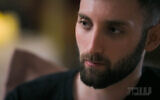 Former hostage Matan Angrest is interviewed on Channel 12's "Uvda" program, in an episode that aired February 26, 2026. (Screenshot)