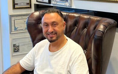 Born and raised in Tehran, Roni Aynsaz, owner of the SCOOP shoe chain, worked in a court under the Revolutionary Guards before fleeing the country and moving to Israel. (Courtesy) Born and raised in Tehran, Roni Aynsaz, owner of the SCOOP shoe chain, worked in a court under the Revolutionary Guards before fleeing the country and moving to Israel. (Courtesy)