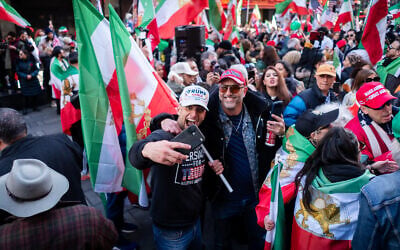 A rally in support of US and Israeli strikes against Iran, in Times Square, New York City, March 1, 2026. (Luke Tress/Times of Israel)