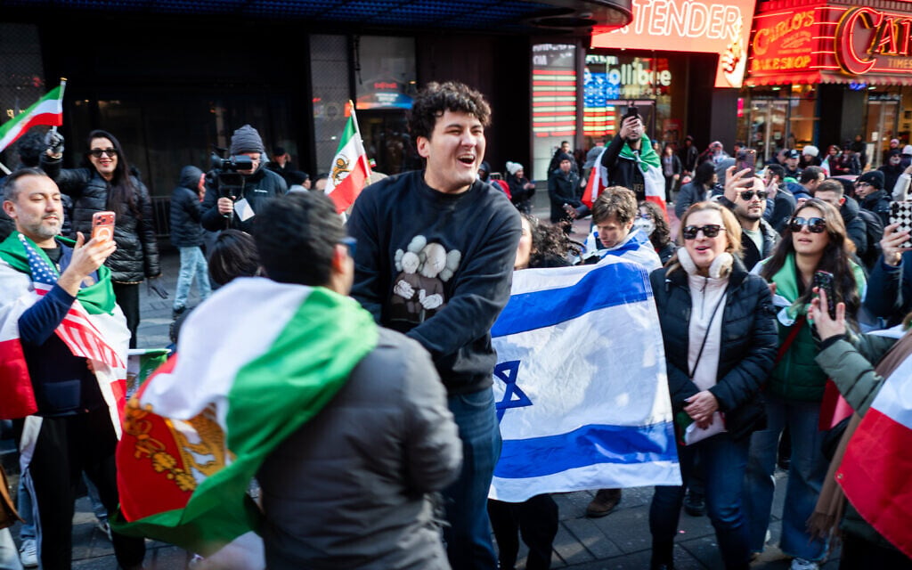 A rally in support of US and Israeli strikes against Iran, in Times Square, New York City, March 1, 2026. (Luke Tress/Times of Israel)