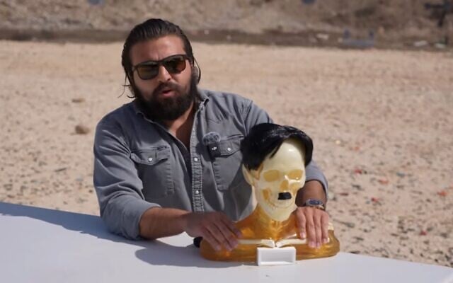 Brandon Herrera, a firearms YouTuber and US congressional candidate, poses with a bust of Hitler in a March 2025 video. (Screenshot via YouTube; used in accordance with Clause 27a of the Copyright Law) Brandon Herrera, a firearms YouTuber and US congressional candidate, poses with a bust of Hitler in a March 2025 video. (Screenshot via YouTube; used in accordance with Clause 27a of the Copyright Law)